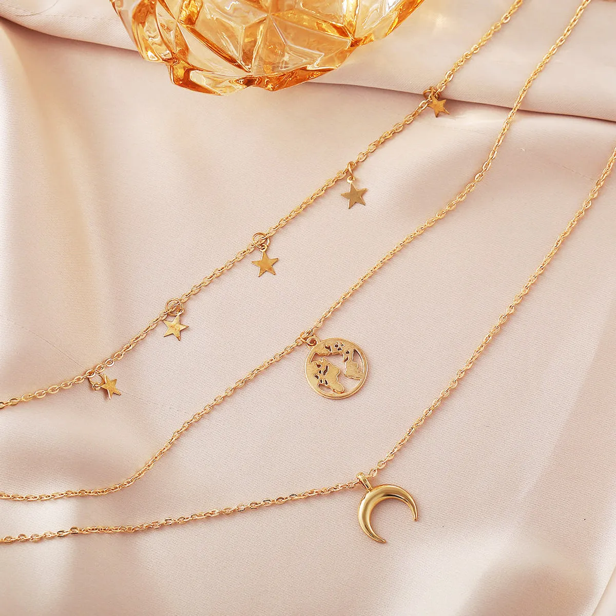 Scintillare by Sukkhi Glamorous Gold Plated Tripal Layered Moon Star Necklace for Women